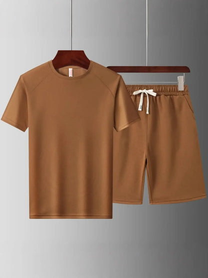 Men's plus size brown short sleeve top and shorts set with drawstring and pockets, slightly stretchy fabric.