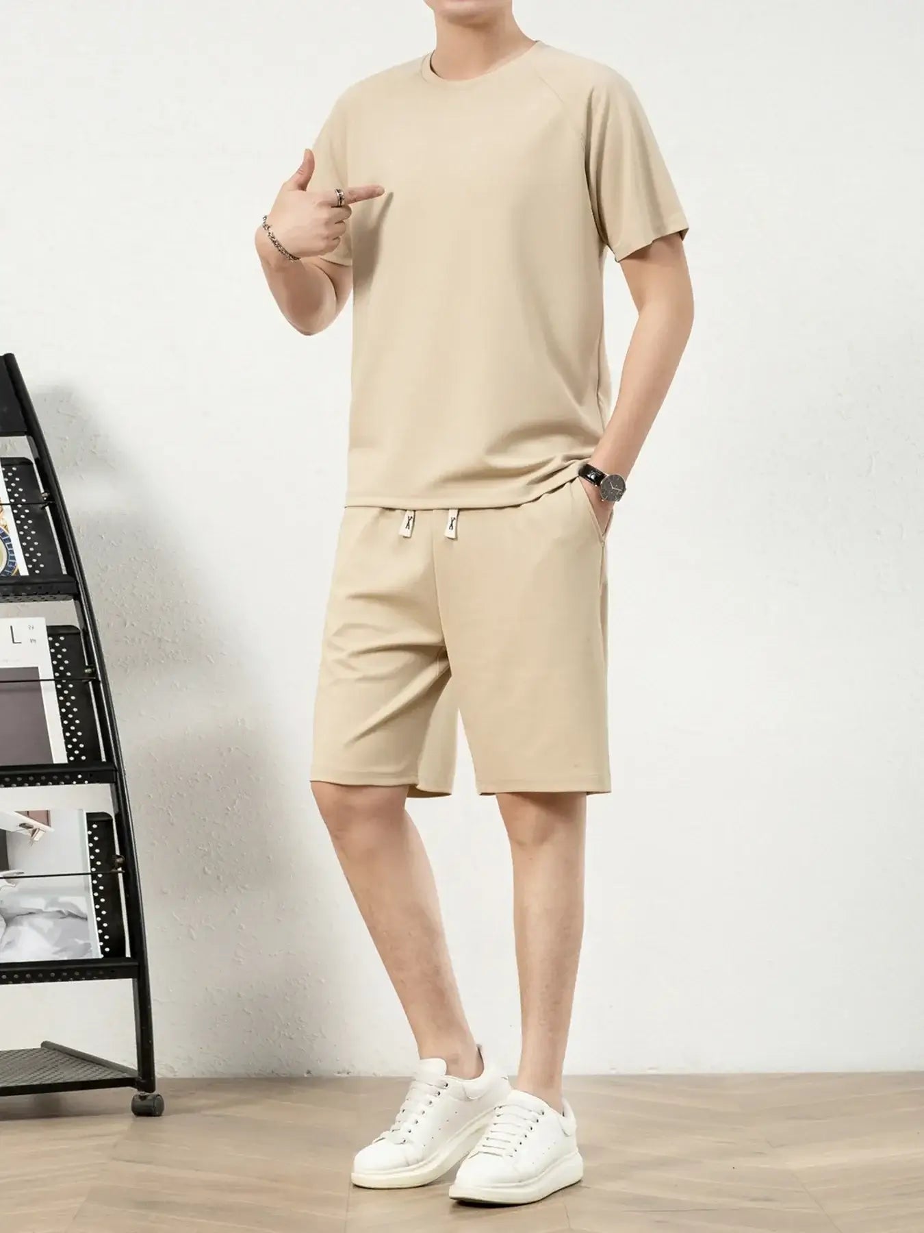 Men's plus size short sleeve top and shorts set in beige, featuring drawstring and pockets.