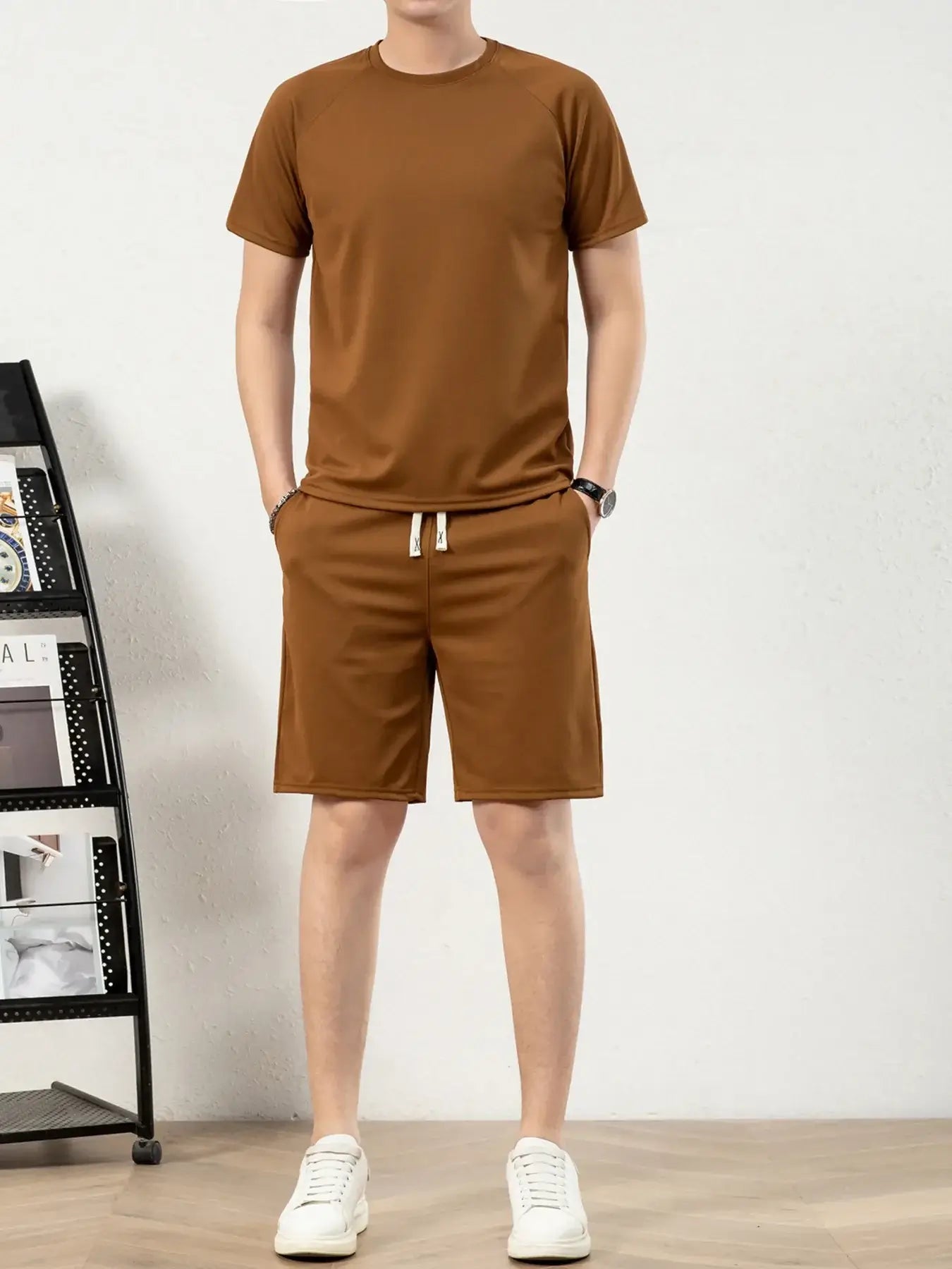 Men's plus size brown short sleeve top and shorts set, featuring drawstring and pockets, slightly stretchy material.