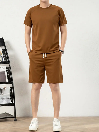 Men's plus size brown short sleeve top and shorts set, featuring drawstring and pockets, slightly stretchy material.