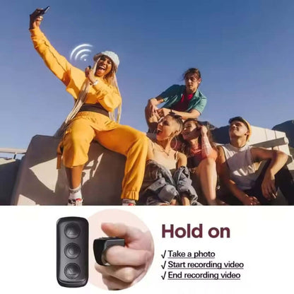 Group enjoying selfies and videos with Smart BT Remote Ring, capturing moments effortlessly outdoors.