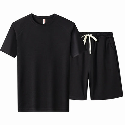 Men's plus size black short sleeve top and shorts set with drawstring and pockets.